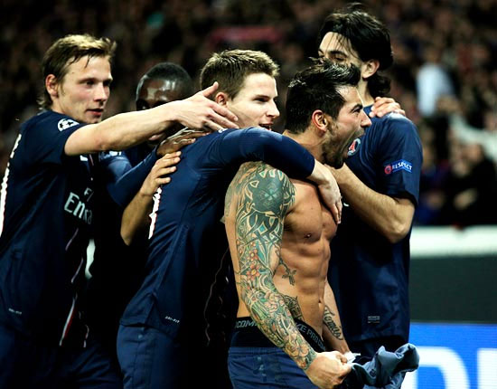 PSG's Ezequiel Lavezzi (right) celebrates with teammates after scoring a goal