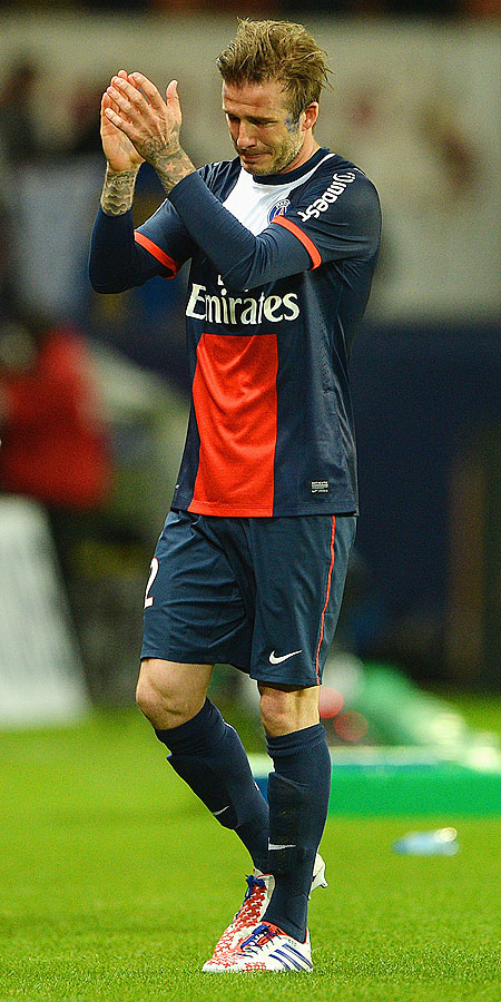 David Beckham of PSG reacts as he is substituted during the Ligue 1 match
