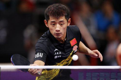 China's Zhang Jike returns the ball during his men's singles final at the World Team Table Tennis Championships in Paris