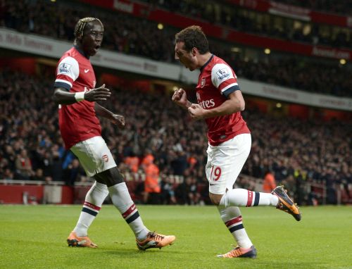 Arsenal's Santi Cazorla (R) with team-mate Bacary Sagna celebrates after scoring a goal