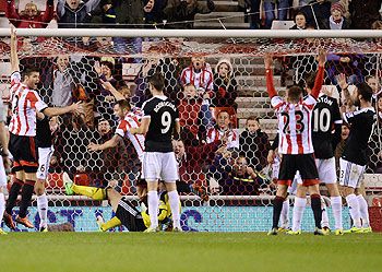 Sunderland's Phil Bardsley (2nd from left) celebrates after scoring against Southampton during their English League Cup fourth round match at the Stadium of Light in Sunderland, on Wednesday