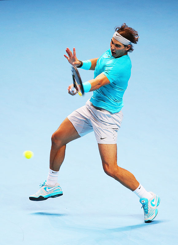 Rafael Nadal of Spain plays a forehand during his men's singles semi-final match against Roger Federer of Switzerland during their ATP World Tour Finals at O2 Arena in London on Sunday