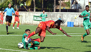 Pune FC striker Riga Mustapha (right) is challenged by an opponent during their I-League match on Friday