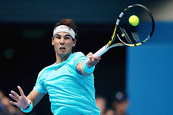 Rafael Nadal of Spain returns a shot during his men's quarter-final match against Fabio Fognini of Italy on Friday
