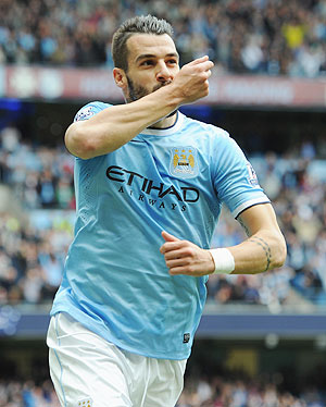 Alvaro Negredo of Manchester City celebrates after scoring to level the scores against Everton during their English Premier League match