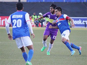 Bengaluru FC's Sunil Chhetri dribbles past the rival defence
