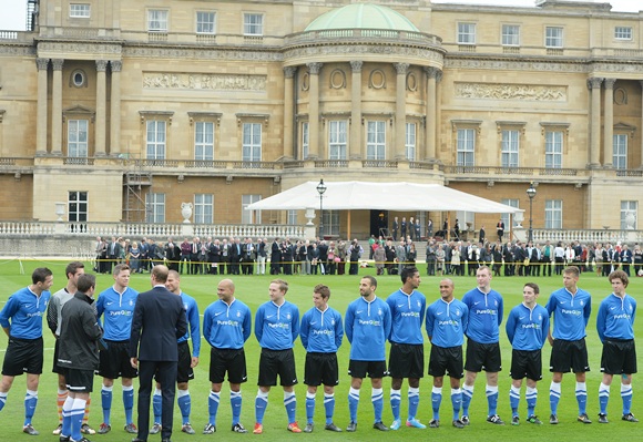 Prince William, Duke of Cambridge greets the Polytechnic FC   players before a Southern Amateur League football match in the grounds of Buckingham Palace