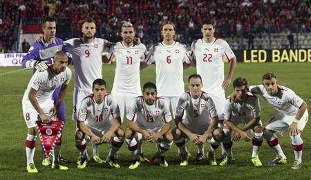 Switzerland's team poses for the media before their 2014 World Cup qualifying football match against Albania at Qemal Stafa stadium in Tirana October 11, 2013.