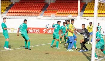Action from the I-League match between Salgaocar (green jersey) and Mumbai FC