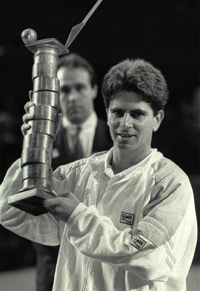 Amos Mansdorf of Israel holds his trophy after winning the final of the Paris Open in 1988