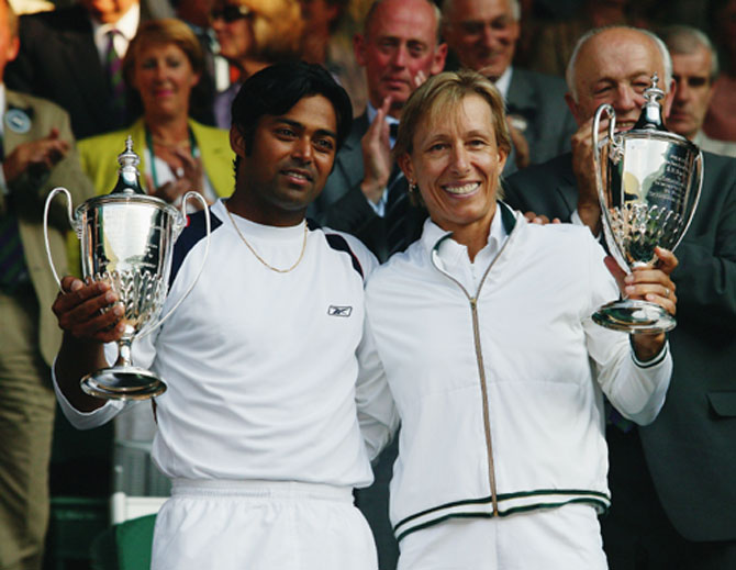 Leander Paes and Martina Navratilova with the Wimbledon trophy
