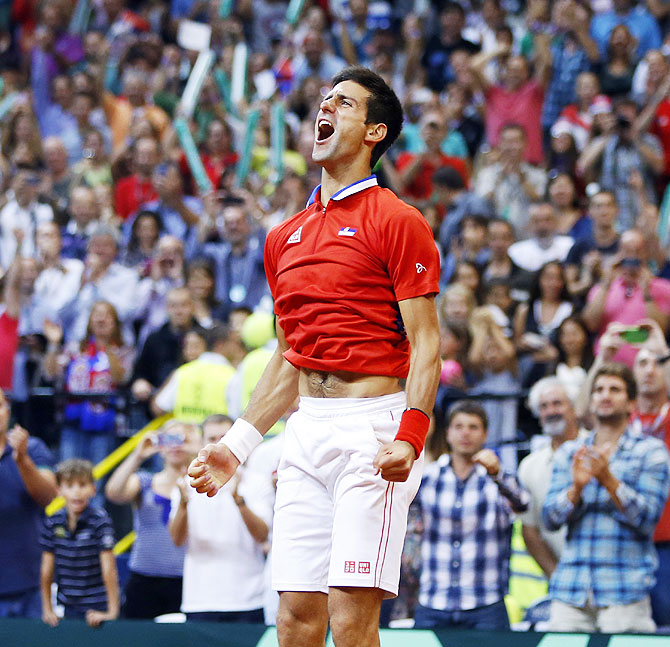 Serbia's Novak Djokovic celebrates his victory over Canada's Milos Raonic after their Davis Cup semi-final tennis match in Belgrade on Sunday