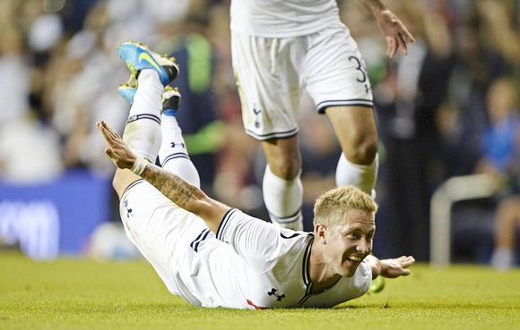 Tottenham Hotspur's Lewis Holtby dives on the ground