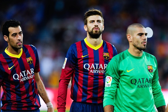 Gerard Pique of FC Barcelona looks on