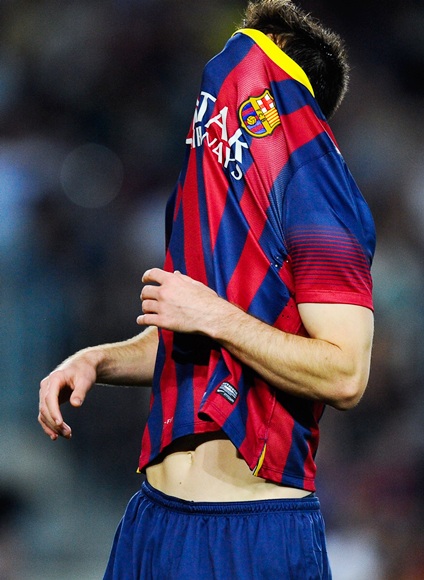 Lionel Messi of FC Barcelona reacts after missing a chance