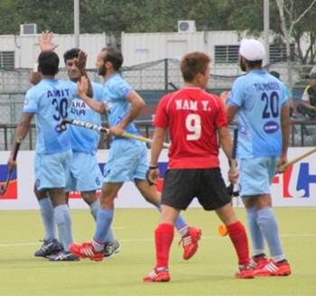 Indian players celebrate a goal