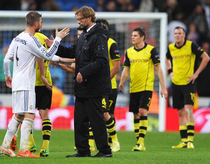 Sergio Ramos of Real Madrid shakes hands with Juergen Klopp, Coach of Borussia Dortmund