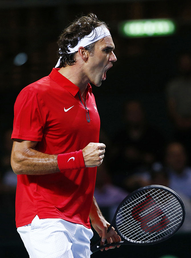 Roger Federer of Switzerland reacts during his Davis Cup quarter-final tennis match against Mikhail Kukushkin of Kazakhstan in Geneva on Friday