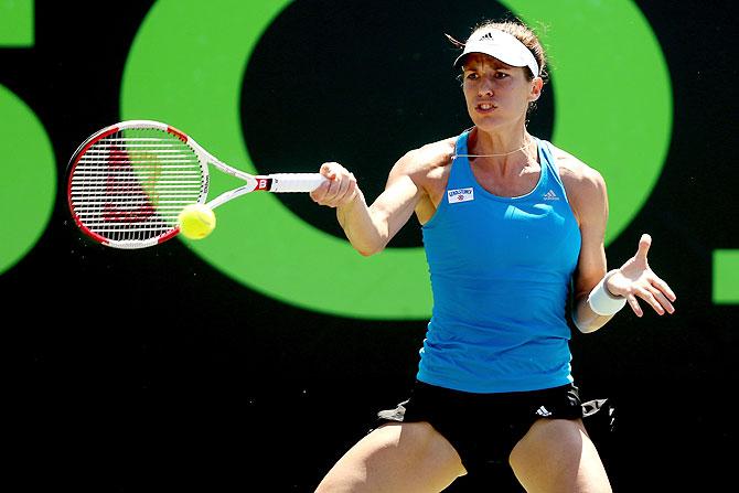 Andrea Petkovic of Germany returns a shot