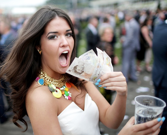 A woman shows off her winnings