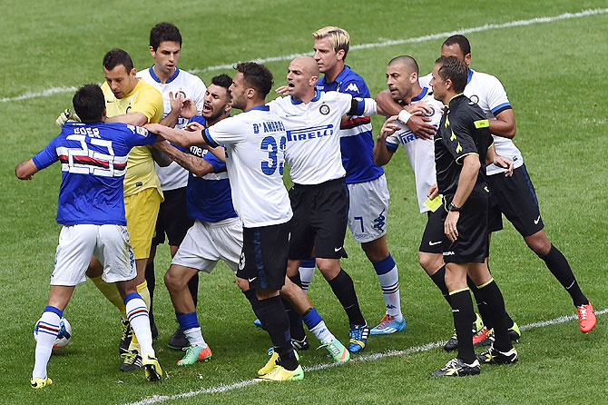 Inter Milan and Sampdoria players get involved in a scuffle during their Serie A match at Stadio Luigi Ferraris in Genoa, Italy on Sunday