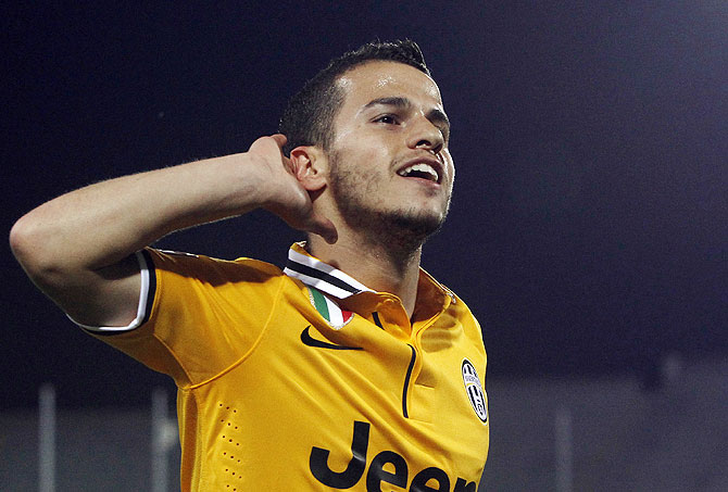 Juventus' Sebastian Giovinco celebrates after scoring a goal against Udinese during their Serie A match at the Friuli stadium in Udine on Monday