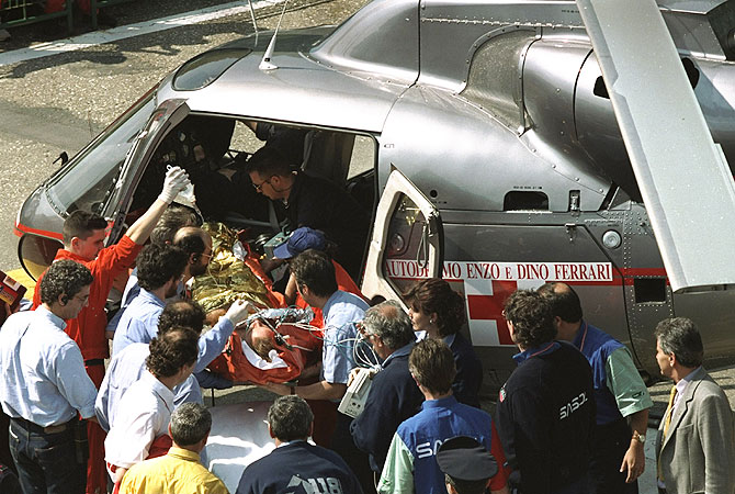 Rubens Barrichello of Brazil is airlifted to the hospital after crashing at 160 mph in his Jordan Hart during the first official practice for the San Marino Grand Prix at the Imola circuit in San Marino on May 1, 1994