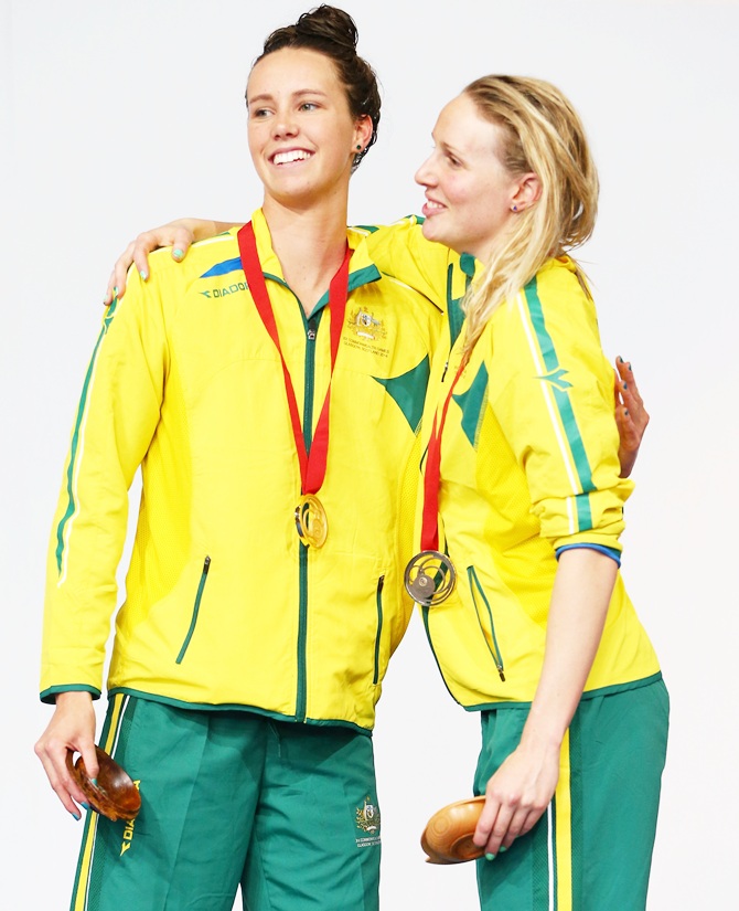 Gold medallist Emma McKeon, left, of Australia poses with bronze medallist Bronte   Barratt of Australia during the medal ceremony for the Women's 200m Freestyle Final