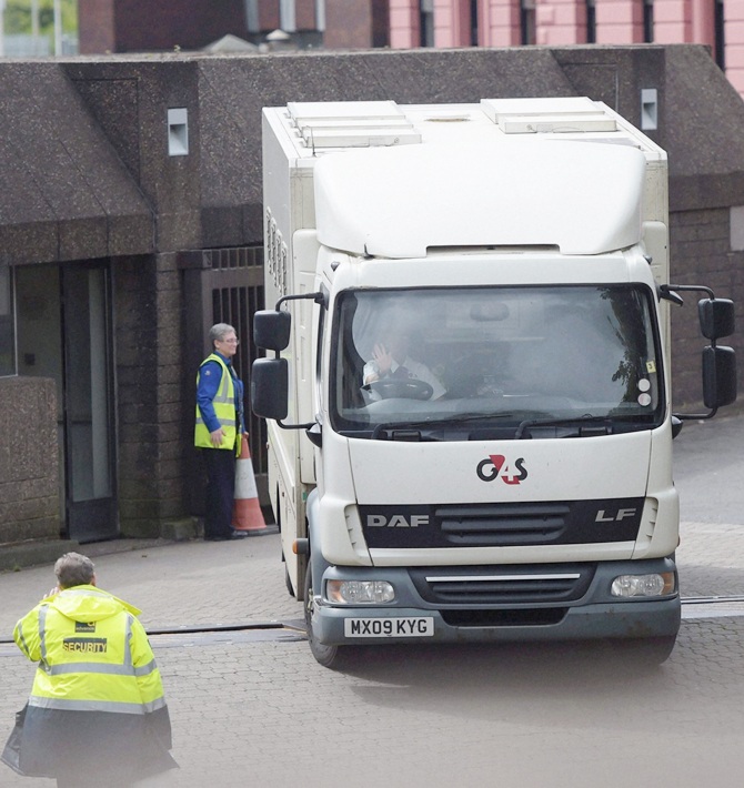 A police van carrying IOA officials arrives the Sheriff Court of Glasgow and Strathkel on Monday