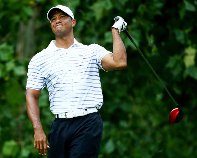 Tiger Woods of the United States reacts on the seventh tee during the second round of the 96th PGA Championship at Valhalla Golf Club in Louisville, Kentucky on Friday