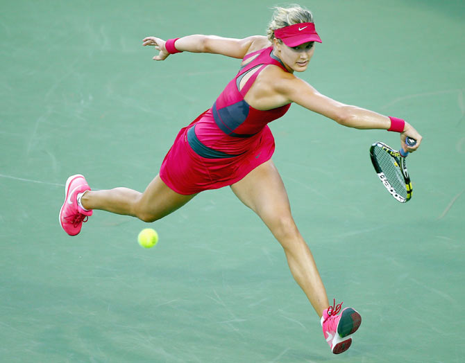 Eugenie Bouchard of Canada hits a return during her match against Svetlana Kuznetsova on day 5 at Western & Southern Open at the Linder Family Tennis Center in Cincinnati on Wednesday