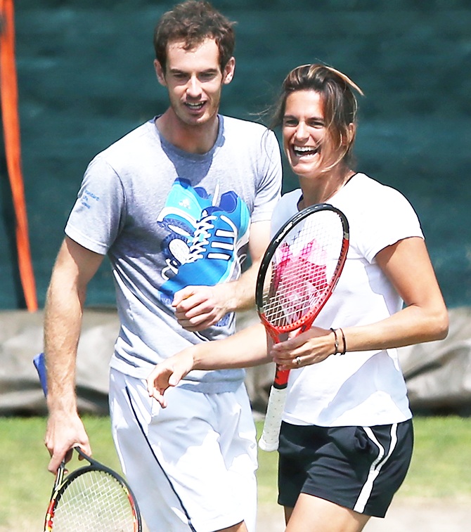 Andy Murray of Great Britain with coach Amelie Mauresmo during a practice session
