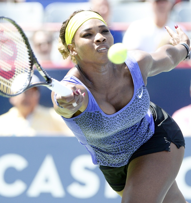 Serena Williams hits a forehand