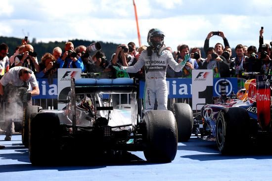 Nico Rosberg of Germany and Mercedes GP reacts as he gets out of his car in Parc Ferme