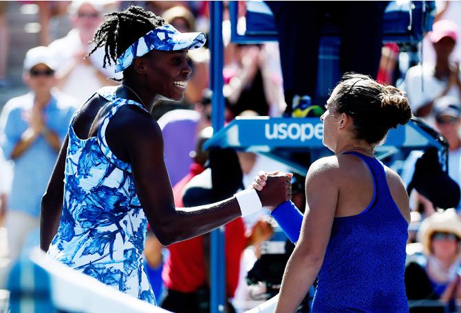 Venus Williams of the United States greets Sara Errani of Italy after losing in their women's singles third round match
