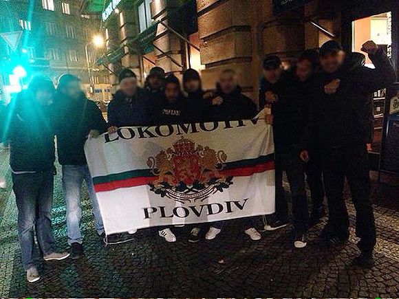 Fans of Lokomotiv Plovdiv hold the club flag