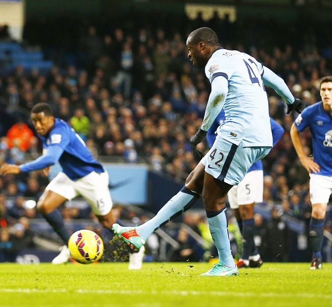 Yaya Toure of Manchester City scores