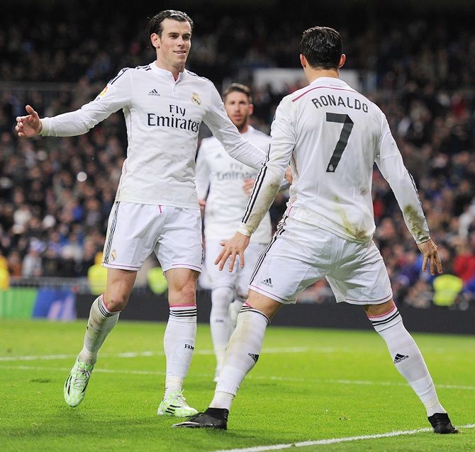 Cristiano Ronaldo of Real Madrid celebrates with Gareth Bale