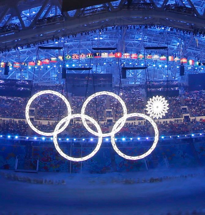 Four of five Olympic Rings are seen lit up during the opening ceremony of the 2014 Sochi Winter Olympics
