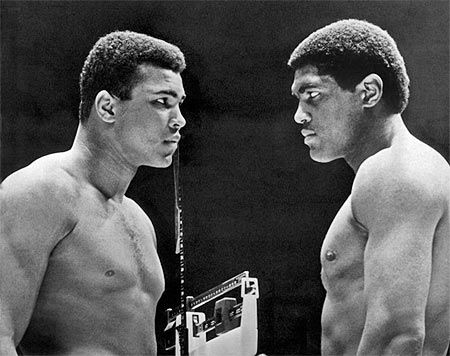 Heavyweight champion Cassius Clay (left) focuses his whammy eye on challenger Ernie Terrell