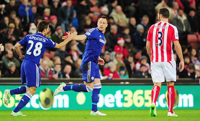 Chelsea's John Terry (centre) celebrates after scoring the opening goal against Stoke City