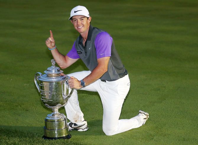 Rory McIlroy of Northern Ireland poses with the Wanamaker trophy after his one-stroke victory during the final round of the 96th PGA Championship at Valhalla Golf Club in Louisville, Kentucky, on August 10