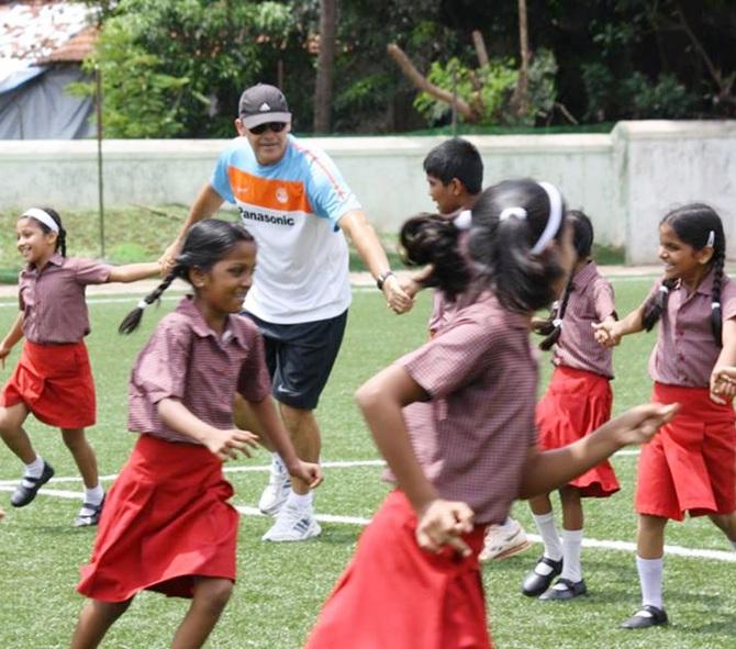 Scott O'Donnell with school children.