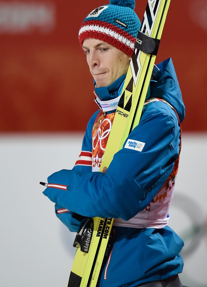 Michael Hayboeck of Austria looks during the Men's Large Hill Individual.