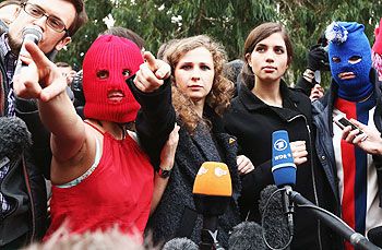 Members of protest group Pussy Riot speak during a press conference on February 20, 2014 in Sochi