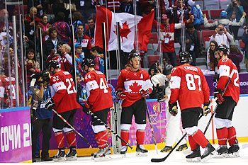 Canada's ice-hockey team celebrates after defeating USA in the semi-final at Sochi on Friday