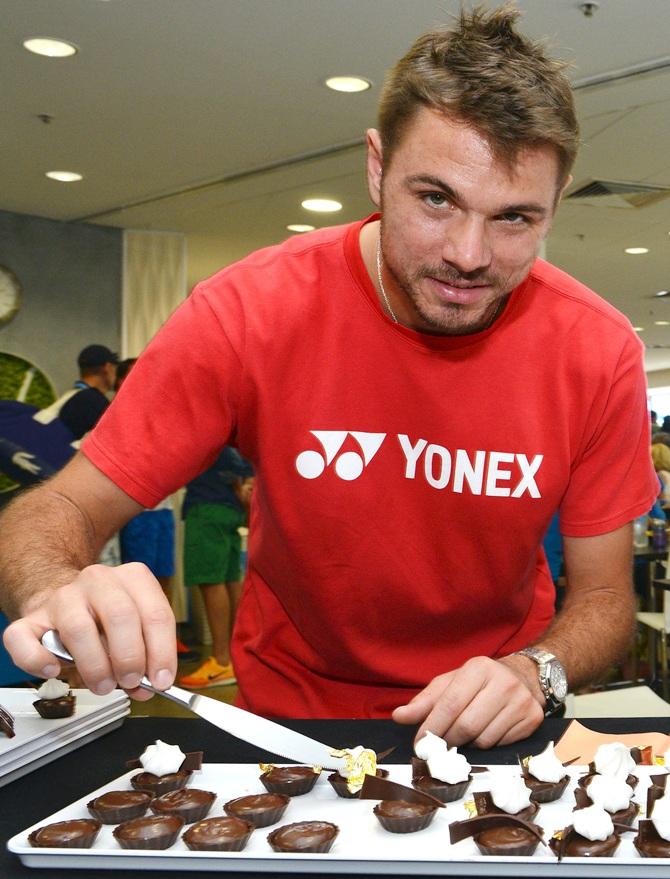 Stanislas Wawrinka of Switzerland preparing dessert.