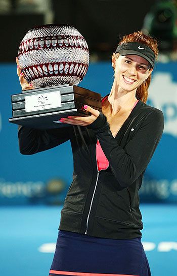 Tsvetana Pironkova of Bulgaria poses with the trophy after winning the Womens Singles Final match against Angelique Kerber of Germany at the Sydney International at Sydney Olympic Park Tennis Centre on Friday
