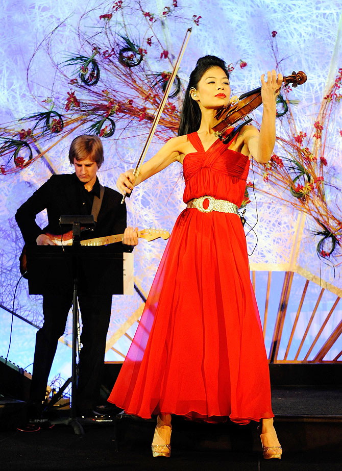 Violinist Vanessa-Mae (right) performs 