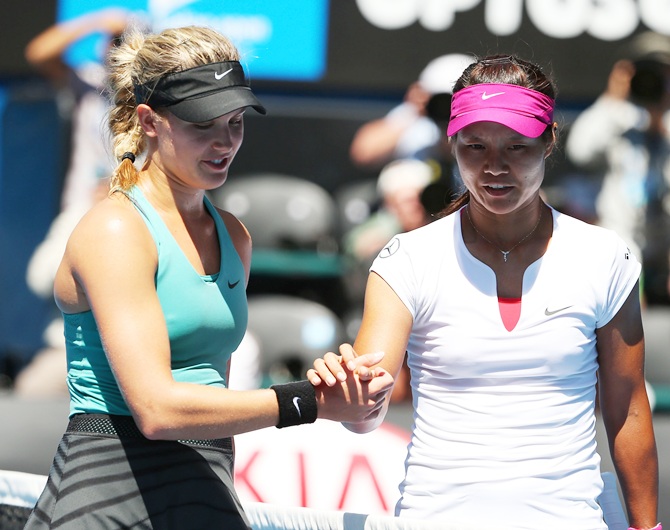 Na Li of China shakes hands with Eugenie Bouchard of Canada after Li won their semifinal match